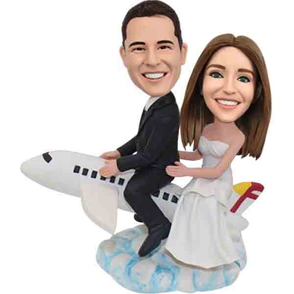 Personalized Wedding Bobbleheads Travel on Airplane