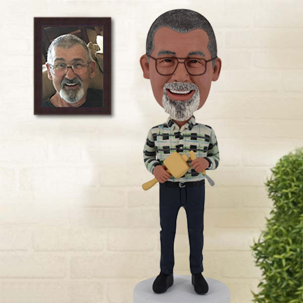 Bobblehead woodworker with mallet chisel