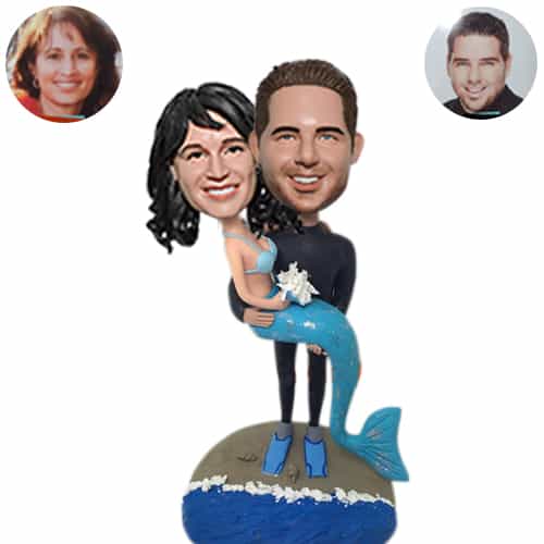 Bobbleheads groom carrying Mermaid bride