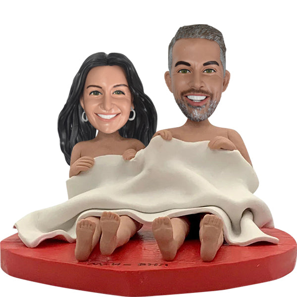 Couple Bobblehead under Sheets