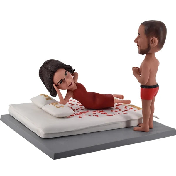 Couple Bobblehead Man Standing Before Her Bed