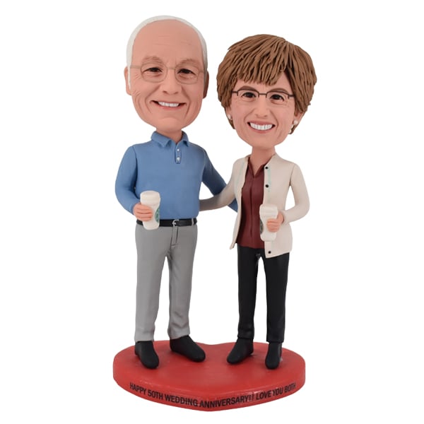 Man and Woman Bobbleheads holding Starbucks coffee