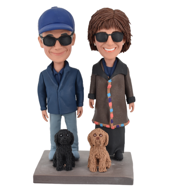 Couple Bobbleheads with dogs