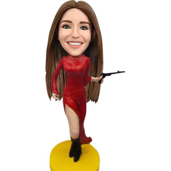 Bobblehead dolls cool girl with gun