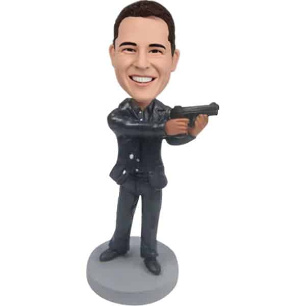 Personalized bobblehead holding gun