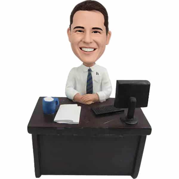 Personalized bobblehead at desk