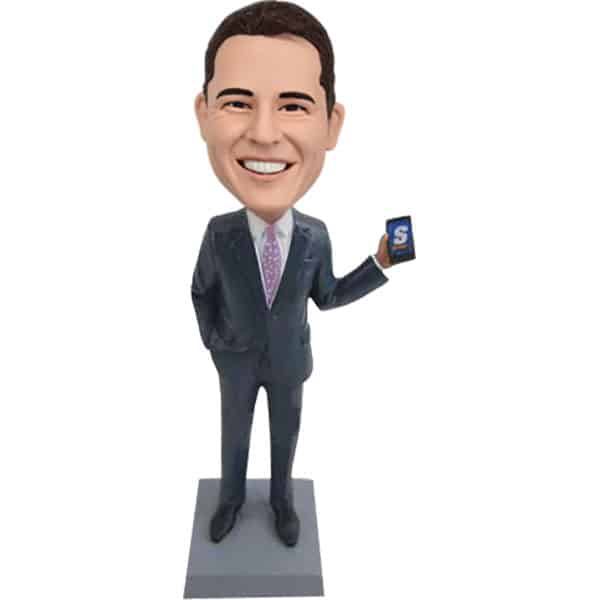 Custom bobbleheads with cellphone salesman