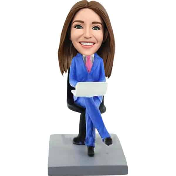 Custom bobbleheads with laptop boss in chair