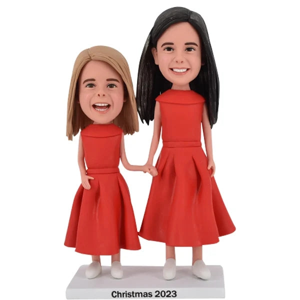 Mother and Daughter Bobblehead with same outfit