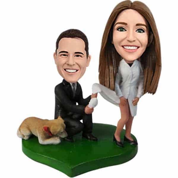 Custom bobbleheads groom and bride cake toppers
