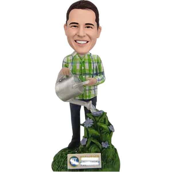 Custom bobblehead watering flowers