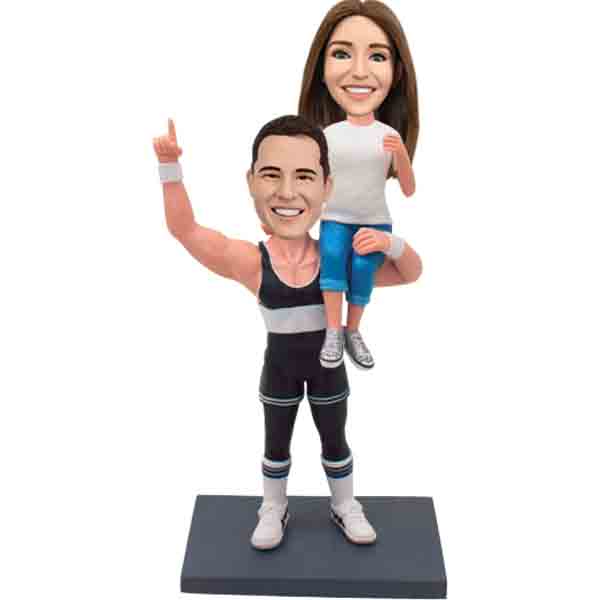 Personalized bobbleheads man holding woman