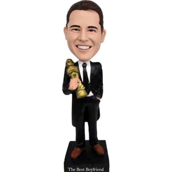 Custom Bobblehead doll holding trophy