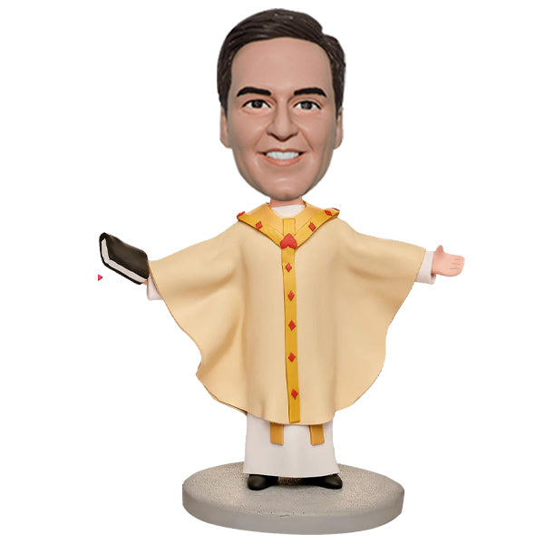 Priest bobblehead