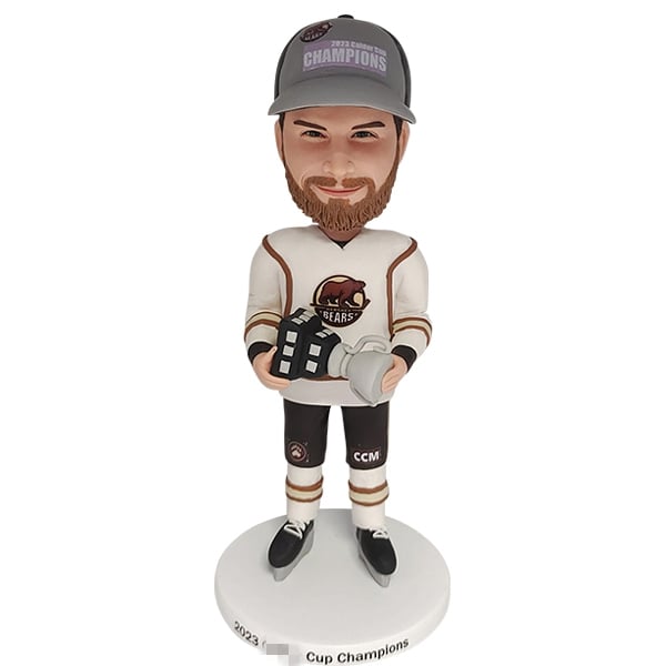 Hockey Bobblehead holding Trophy