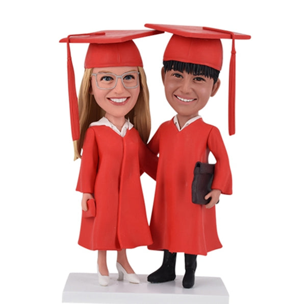 Custom Graduation bobbleheads with two on one base