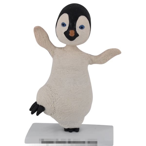 Cartoon penguin bobblehead personalized from photo