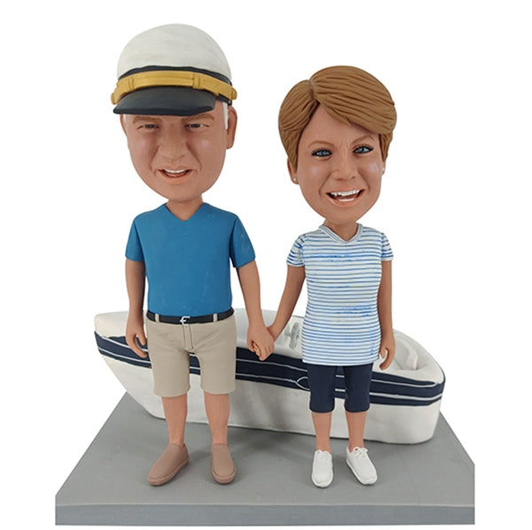 Couple Bobbleheads with Boat