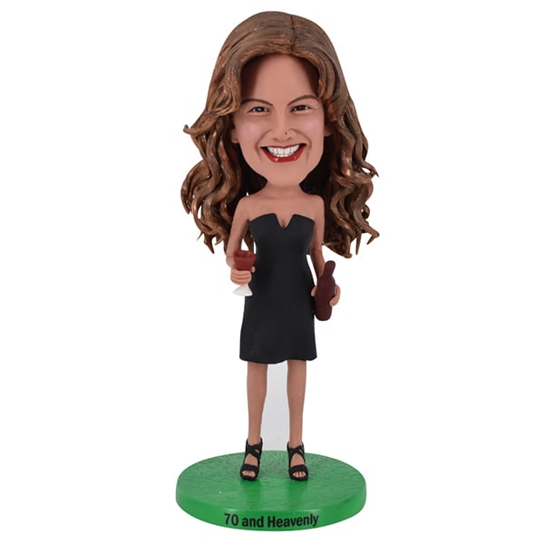 Female Bobblehead with wine bottle and glass martini