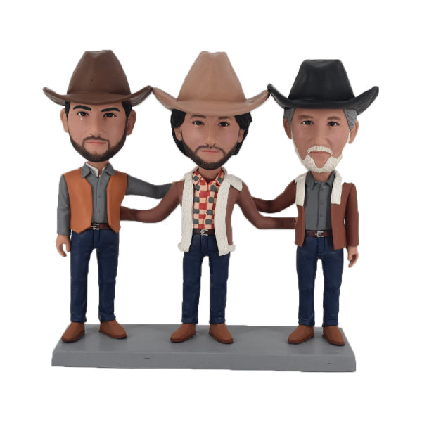 Three Cowboy Bobbleheads Triple