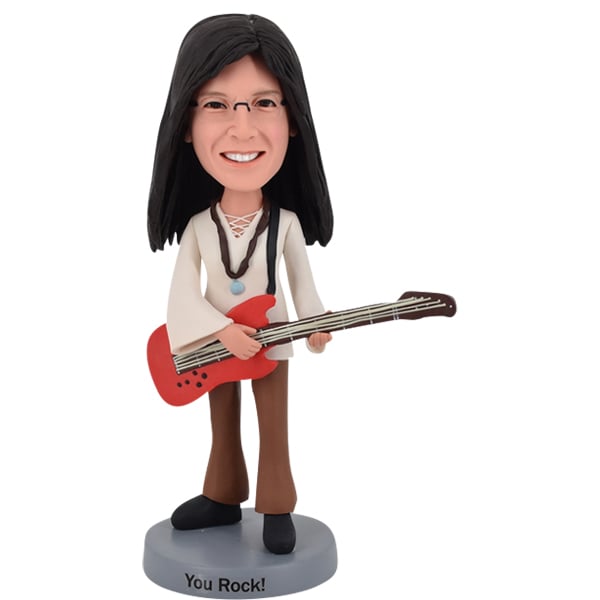 Female Bobble Head playing guitar