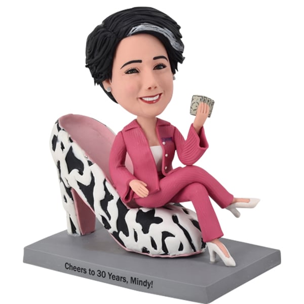 Funny Female Bobblehead sitting in High Heels with dollar