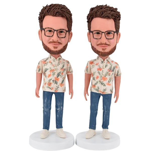 Male Hawaiian bobblehead doll in flower pattern shirt and jeans