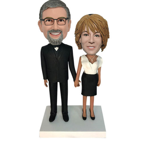 Custom man and woman bobbleheads