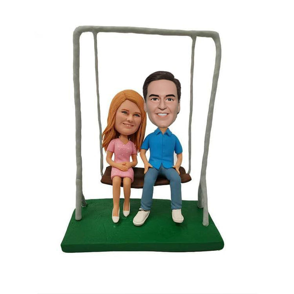 Custom bobbleheads couple on Swing