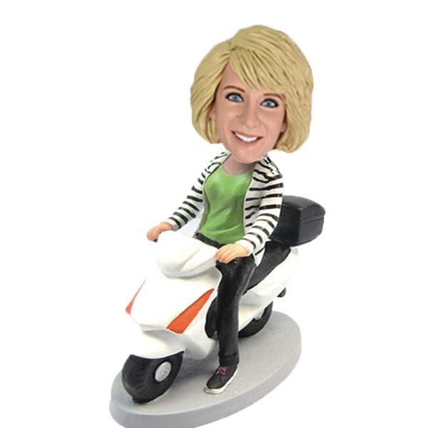 Woman on scooter Bobblehead Doll